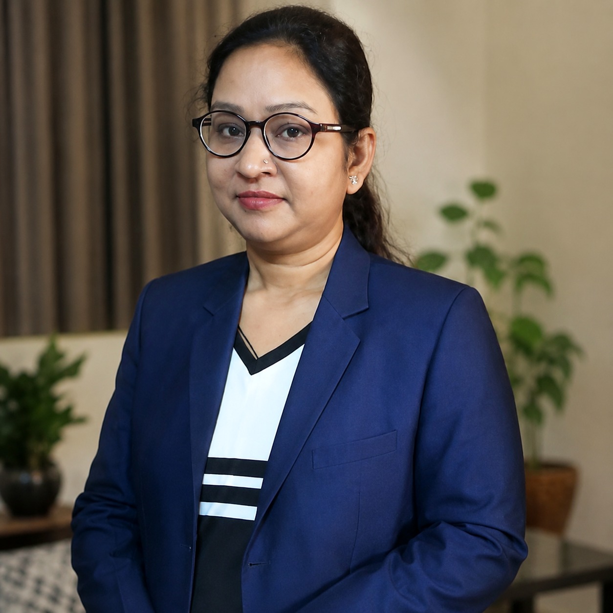 Uzmi Perveen, Wellness Coach, professional portrait